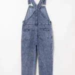 Piper Denim Straight Leg Jumpsuit with Pockets - A casual yet chic denim jumpsuit featuring a straight leg cut, practical pockets, and a timeless design, ideal for effortless everyday style. Displayed on hanger to show back of jumpsuit against all white background.