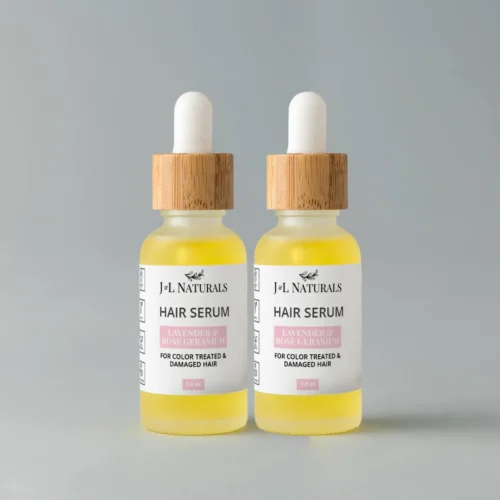 Nourishing Hair Serum Duo for smooth, shiny, and healthy-looking hair. Displayed against a light grey background.