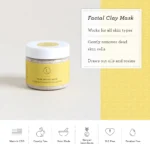 Closed jar of Clay Faciall Mask on white table . displayed on white table with white background. A list of benifits on the side and info regarding the product listed below.
