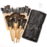 Complete 32-piece professional wooden makeup brush set with soft bristles and eco-friendly handles, ideal for flawless full-face makeup application. Displayed against a white background including a makeup brush pouch.