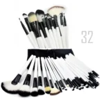 Complete 32-piece professional wooden makeup brush set with soft bristles and eco-friendly handles, ideal for flawless full-face makeup application. Displayed against a white background including a makeup brush pouch.