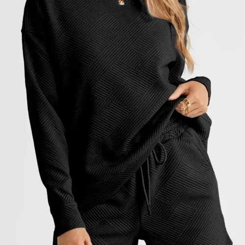 Close-up view of Adalyn loungewear set featuring a textured long sleeve top and matching drawstring shorts, cozy and stylish two-piece lounge outfit for women.