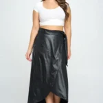 Model wearing a chic faux leather maxi wrap skirt with a high waist and side tie detail, showcasing a sleek, elegant look perfect for modern street style or evening wear.