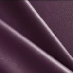 Close-up of the faux leather maxi wrap skirt showing the high-waist detail, smooth leather texture, and side tie closure for a sleek and stylish look.