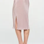 Side view of elegant Made in USA solid plissé midi skirt with side slit, showcasing lightweight pleated texture and timeless chic design — perfect for day-to-night wear by BeautyPlusFashion.