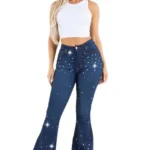 Model wearing high waisted glam bell bottom jeans – 32 inseam women’s Vegas style denim