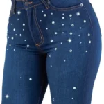 Close up of women’s rhinestone bell bottom jeans – high waisted with 32 inseam for Vegas fashion