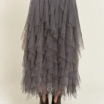 Stylish layered polka dot mesh lined midi skirt for women, flowy and elegant, perfect for casual or party wear.