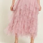 Back view of stylish layered polka dot mesh lined midi skirt for women, flowy and elegant, perfect for casual or party wear.