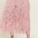 Stylish layered polka dot mesh lined midi skirt for women, flowy and elegant, perfect for casual or party wear.