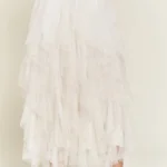 Stylish layered polka dot mesh lined midi skirt for women, flowy and elegant, perfect for casual or party wear.