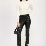 High-waisted lace-up leather trousers with sleek fitted silhouette and front tie detail
