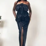 Front view of Athina button-accented black faux leather dress for women