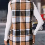 Back view of straw yellow plaid collared vest showing pattern alignment