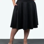 Front view of knee-length circle skirt with side seam pocket showing flared silhouette and elegant drape — BeautyPlusFashion.