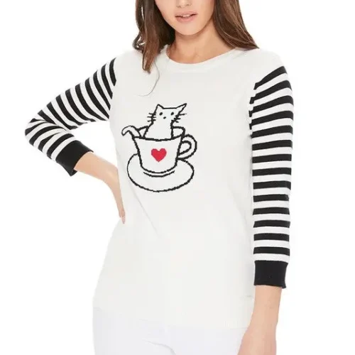 Front view of women’s jacquard sweater featuring adorable cat in cup design