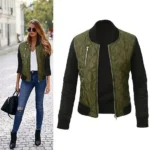 Woman wearing a chic quilted satin bomber jacket unzipped, showing a relaxed layered look.