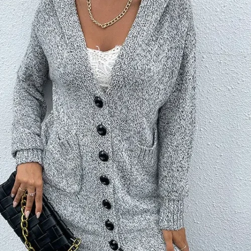 Front closed view of gray knit hooded cardigan featuring soft knit fabric, button or zip closure, relaxed fit silhouette, long sleeves, and attached hood for a cozy and stylish fall or winter layering look.