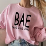 Model wearing a BAE Best Aunt Ever sweatshirt for women with cozy fabric and relaxed fit, styled for casual everyday wear.