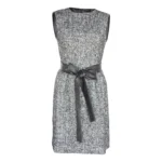 Luxury ebony tweed mini dress showcasing sophisticated boutique fashion with a classic black tweed fabric and modern feminine fit