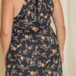 close up back view of plus size floral halter midi dress showing halter neckline detail
