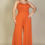 Plus size button front wide leg jumpsuit featuring a flattering front button closure, relaxed fit, and flowy wide leg silhouette designed for a chic and comfortable look