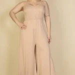 Plus size button front wide leg jumpsuit featuring a flattering front button closure, relaxed fit, and flowy wide leg silhouette designed for a chic and comfortable look