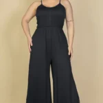 Plus size button front wide leg jumpsuit featuring a flattering front button closure, relaxed fit, and flowy wide leg silhouette designed for a chic and comfortable look