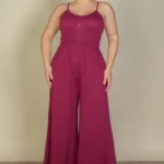 Plus size button front wide leg jumpsuit featuring a flattering front button closure, relaxed fit, and flowy wide leg silhouette designed for a chic and comfortable look