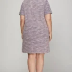 Rear view of plus size tweed dress with pearl trim, highlighting smooth fit and structured design