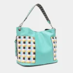 Side angle view of Nicole Lee USA Quihn tote handbag highlighting structured silhouette, spacious interior width, and sleek everyday design