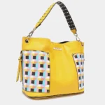 Side angle view of Nicole Lee USA Quihn tote handbag highlighting structured silhouette, spacious interior width, and sleek everyday design