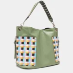 Side angle view of Nicole Lee USA Quihn tote handbag highlighting structured silhouette, spacious interior width, and sleek everyday design